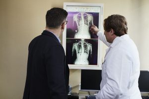 Doctors examining an x ray